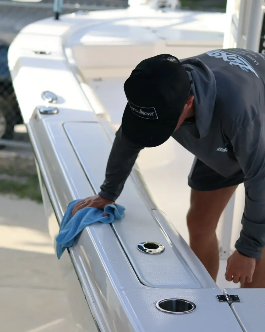 Hand drying a boat's gunwale